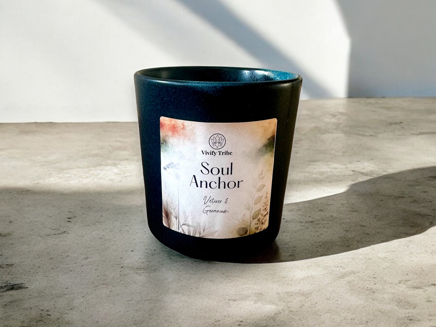 Aromatherapy candle for grounding with scents of vetiver and geranium